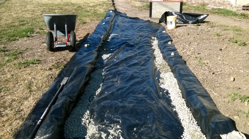 fabric cloth under gravel path WP_20150819_001 Freeway Estates